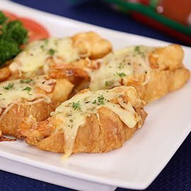 Croissant with Crispy Shrimps and Pizza Sauce and Cheese Croissant with Crispy Shrimps and Pizza Sauce and Cheese